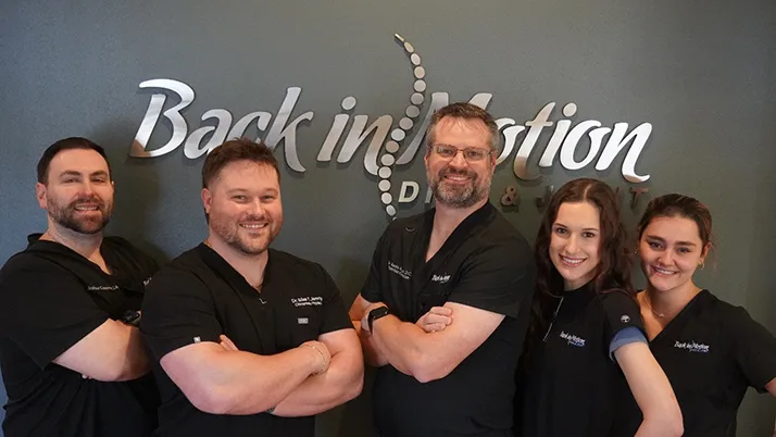 Chiropractor Baton Rouge LA Justin Walbom With Team